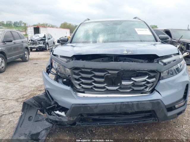 5FNYF8H69SB012063 Honda Passport Awd Trailsport