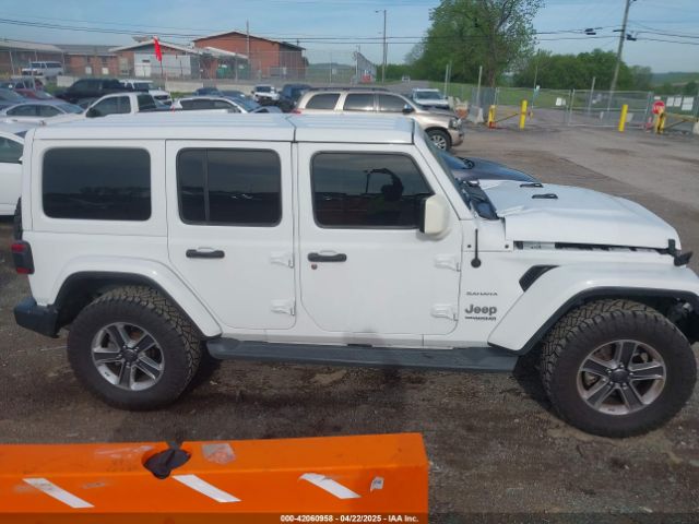 1C4HJXEG4JW319754 Jeep Wrangler Unlimited Sahara 4x4