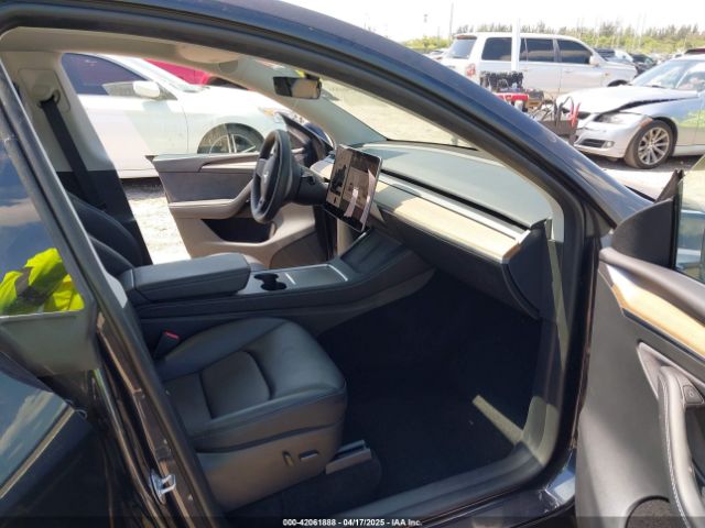 2024 TESLA MODEL Y 7SAYGDED3RF019063 Photo 4