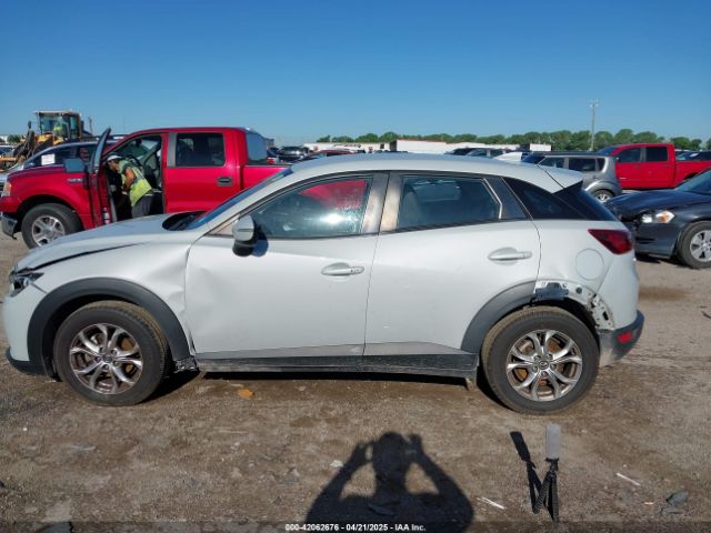 JM1DKDC78G0128945 Mazda Cx-3 Touring