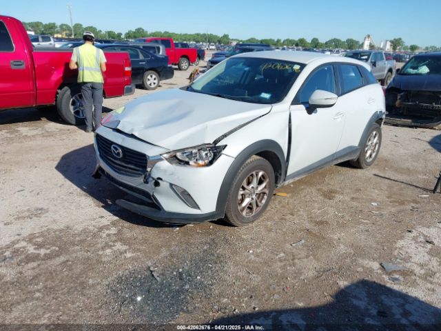 JM1DKDC78G0128945 Mazda Cx-3 Touring