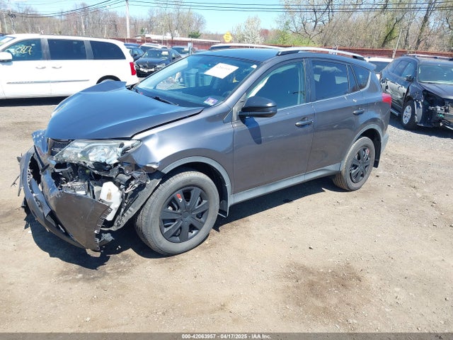 JTMBFREV4FJ037989 Toyota RAV4 LE