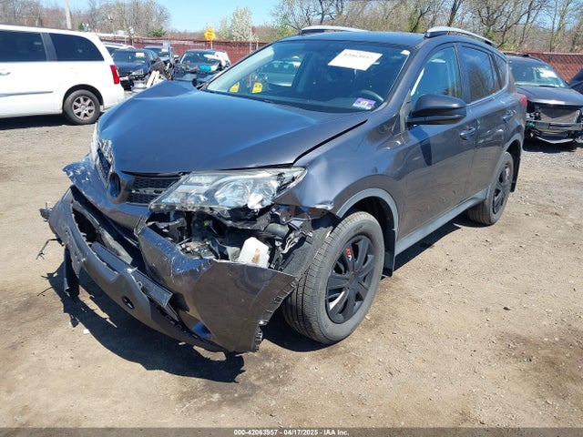 JTMBFREV4FJ037989 Toyota RAV4 LE