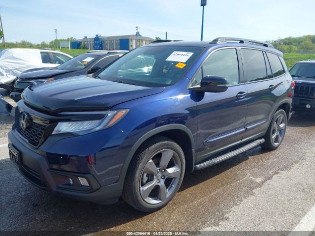 5FNYF8H94LB015299 Honda Passport Awd Touring