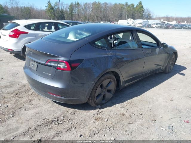 5YJ3E1EB7MF981272 Tesla 2021