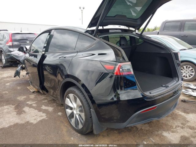 2023 TESLA MODEL Y 7SAYGDEE3PF805175 Photo 2