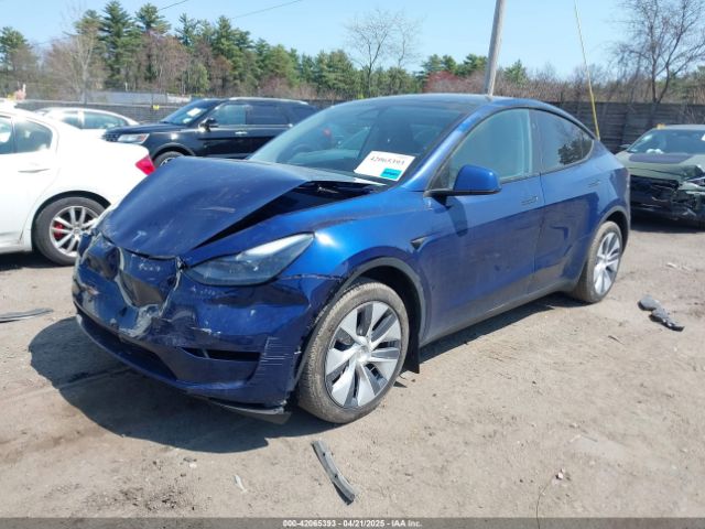 2024 TESLA MODEL Y 7SAYGDEE7RA240977 Photo 1