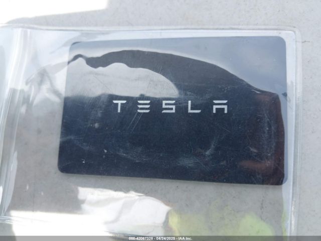 5YJ3E1EB8NF197023 Tesla 2022