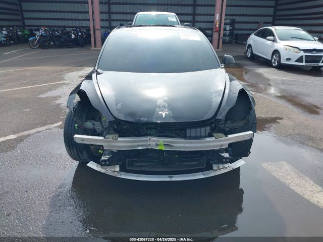5YJ3E1EB8NF197023 Tesla 2022