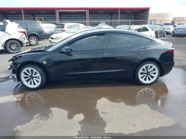 5YJ3E1EB8NF197023 Tesla 2022