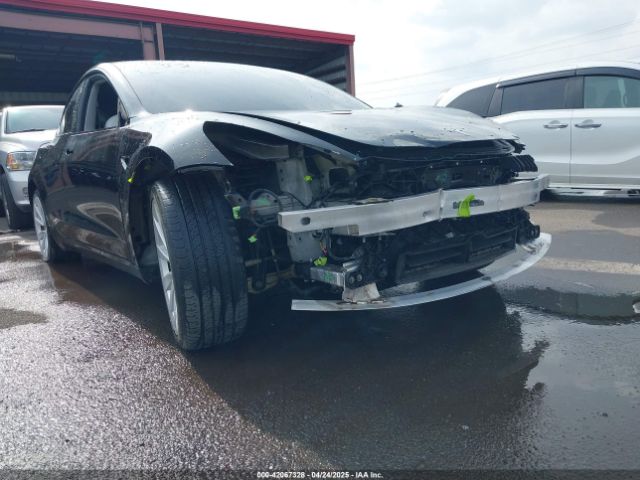 5YJ3E1EB8NF197023 Tesla 2022