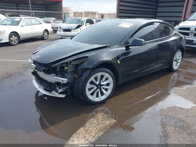 5YJ3E1EB8NF197023 Tesla 2022
