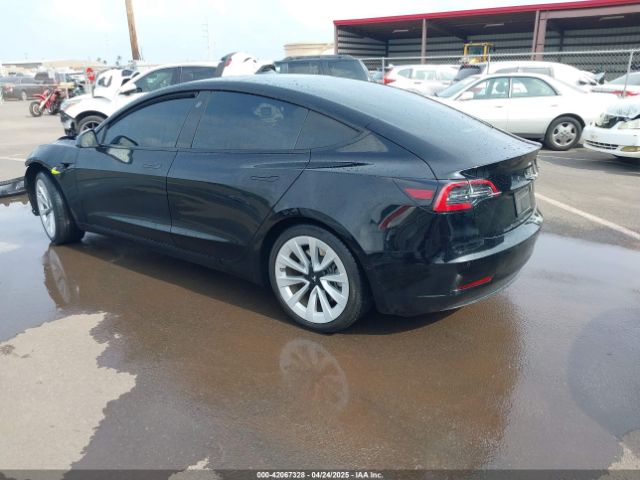 5YJ3E1EB8NF197023 Tesla 2022