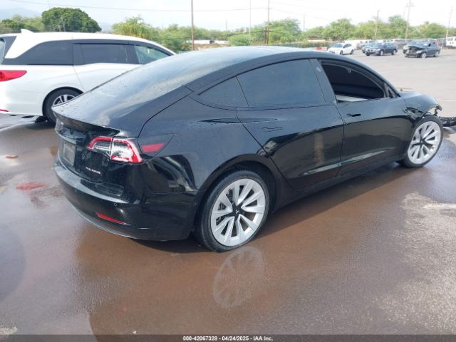 5YJ3E1EB8NF197023 Tesla 2022
