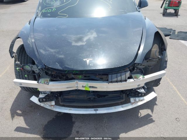 5YJ3E1EB8NF197023 Tesla 2022