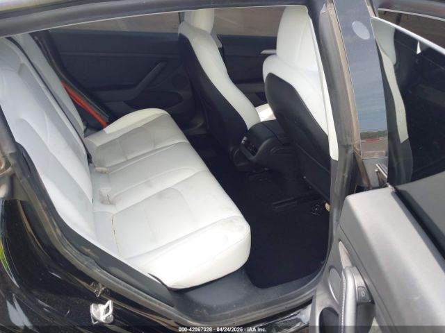 5YJ3E1EB8NF197023 Tesla 2022