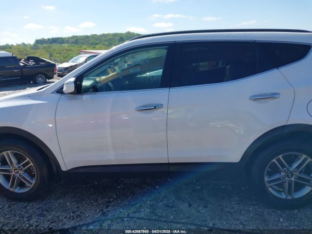 5NMZU3LB8JH060667 Hyundai Santa Fe Sport 2.4l