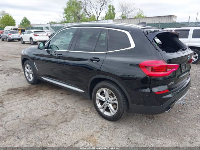 2021 BMW X3 5UXTY5C04M9F93699 Photo 2