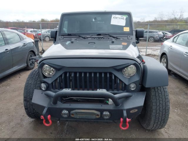 1C4BJWDG6EL239378 Jeep Wrangler Unlimited Sport