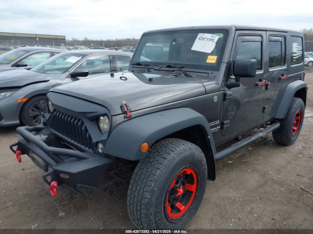 1C4BJWDG6EL239378 Jeep Wrangler Unlimited Sport