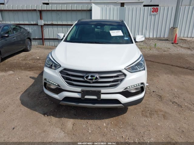 5NMZU3LB7JH085320 Hyundai Santa Fe Sport 2.4l