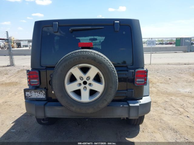 1C4BJWDG9GL161844 Jeep Wrangler Unlimited Sport
