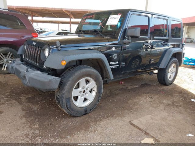 1C4BJWDG9GL161844 Jeep Wrangler Unlimited Sport