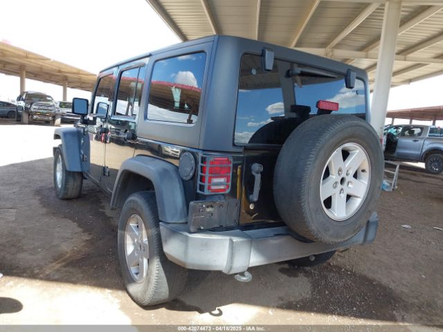 1C4BJWDG9GL161844 Jeep Wrangler Unlimited Sport