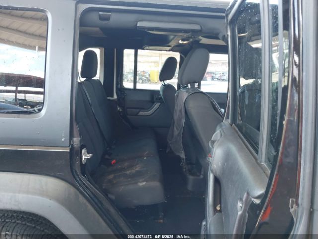 1C4BJWDG9GL161844 Jeep Wrangler Unlimited Sport