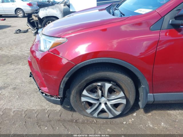 JTMBFREV2JD228186 Toyota RAV4 LE