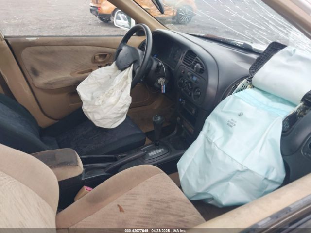 1999 MITSUBISHI MIRAGE JA3AY36C2XU019134 Photo 4