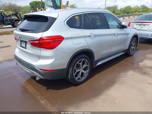 WBXHU7C39J5L04845 BMW X1