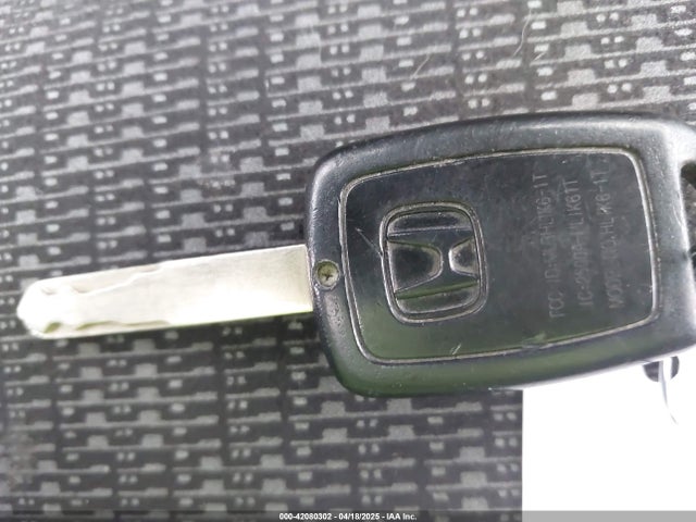 JHMGK5H52GX030560 Honda FIT LX