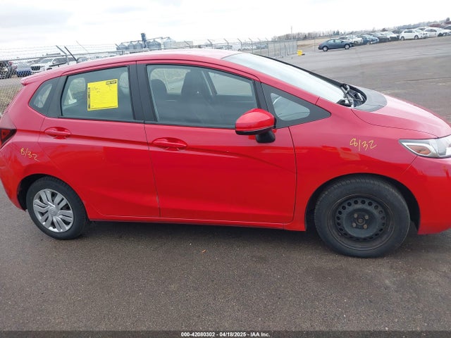 JHMGK5H52GX030560 Honda FIT LX