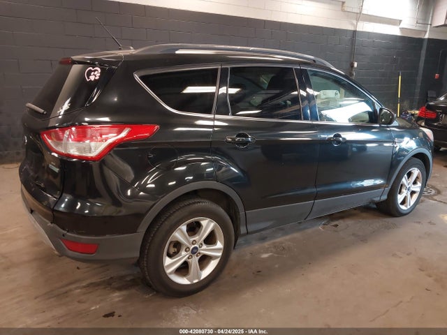 1FMCU0GX6EUE31877 Ford ESCAPE SE