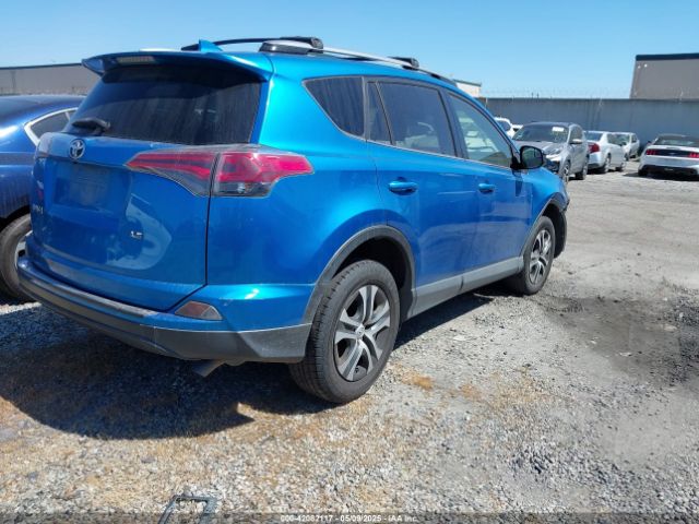 JTMZFREV5JJ154147 Toyota RAV4 LE