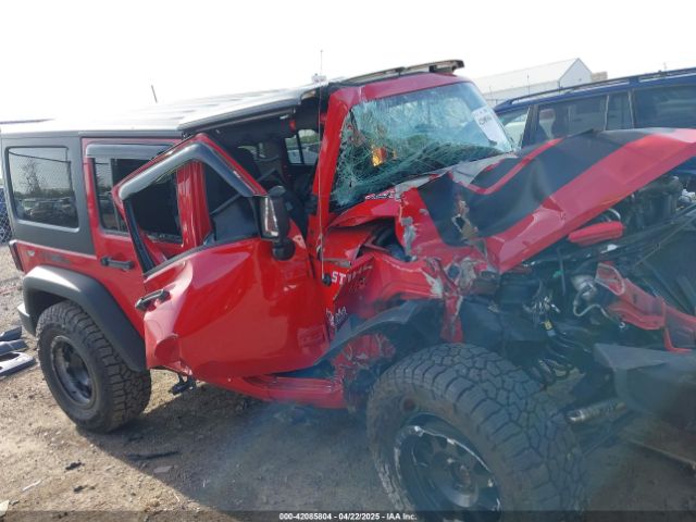 1C4BJWDG9EL229623 Jeep Wrangler Unlimited Sport