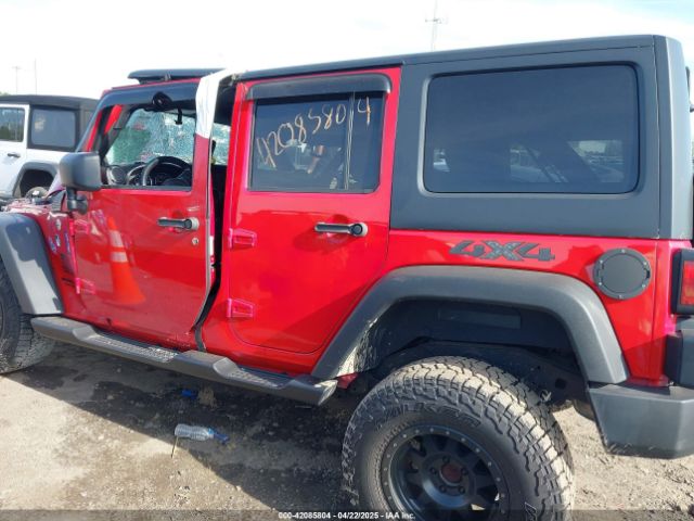 1C4BJWDG9EL229623 Jeep Wrangler Unlimited Sport