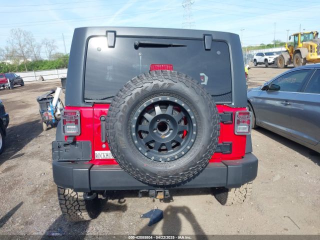 1C4BJWDG9EL229623 Jeep Wrangler Unlimited Sport