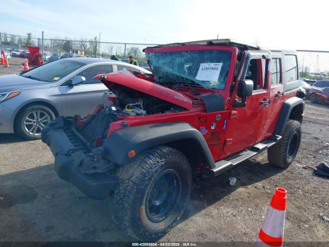 1C4BJWDG9EL229623 Jeep Wrangler Unlimited Sport