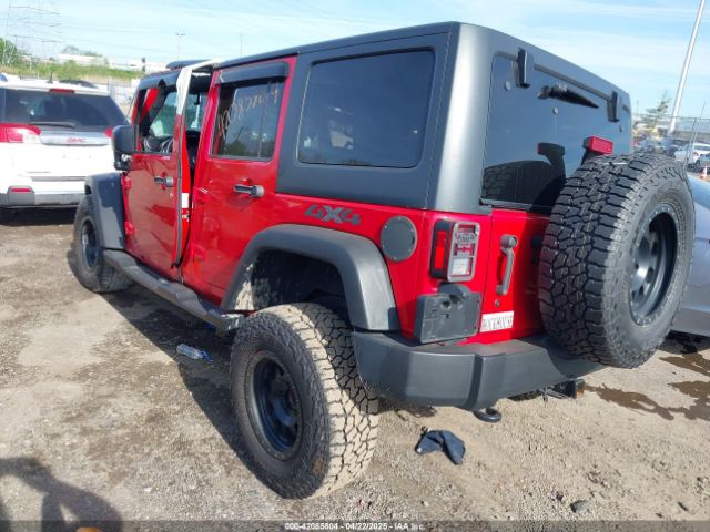 1C4BJWDG9EL229623 Jeep Wrangler Unlimited Sport