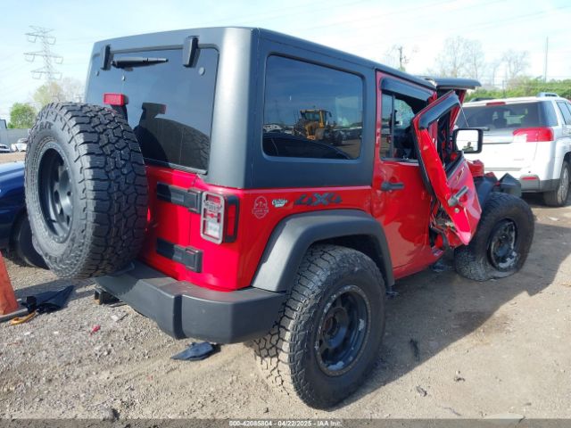 1C4BJWDG9EL229623 Jeep Wrangler Unlimited Sport