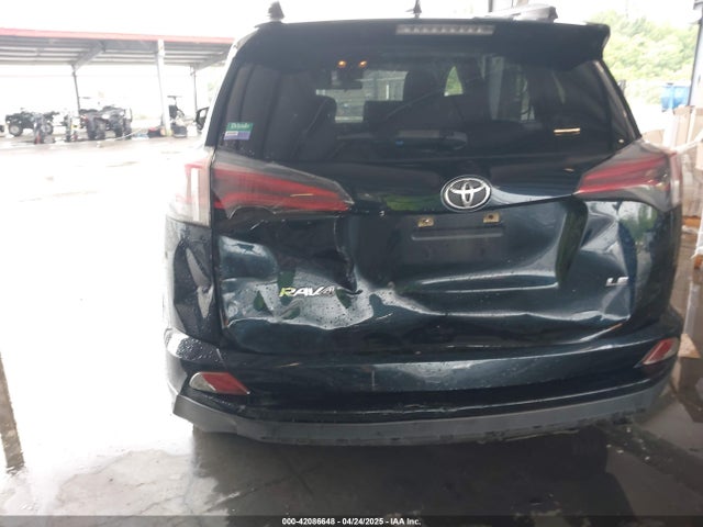 JTMZFREV8JJ191399 Toyota RAV4 LE