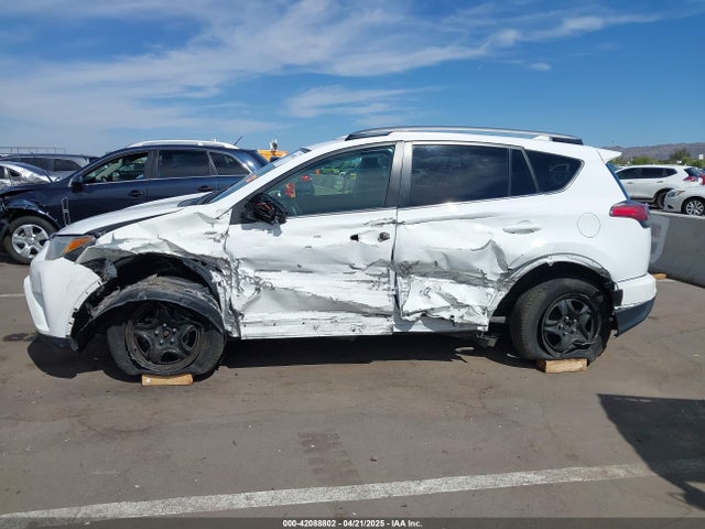 2T3ZFREV4JW424616 Toyota RAV4 LE