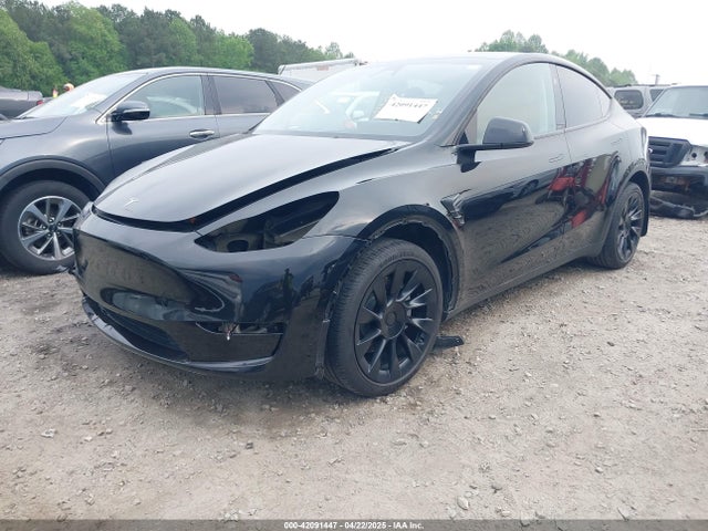 2024 TESLA MODEL Y 7SAYGDEE6RA271573 Photo 1