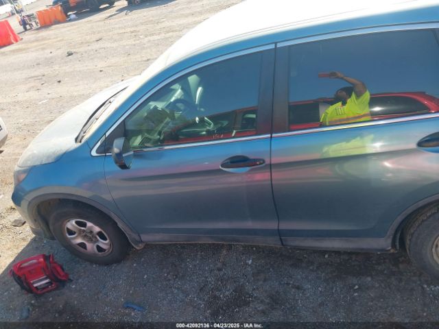 2HKRM3H37EH549233 Honda CR-V LX