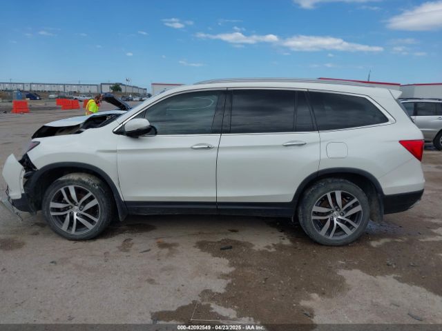 5FNYF6H9XHB034001 Honda Pilot Touring