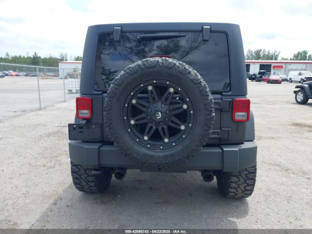 1C4BJWDG0FL706991 Jeep Wrangler Unlimited Sport
