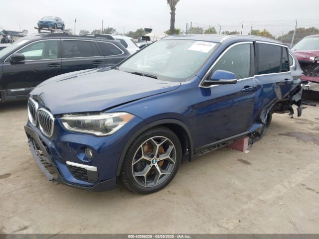 2018 BMW X1 WBXHT3C36J3H30583 Photo 1