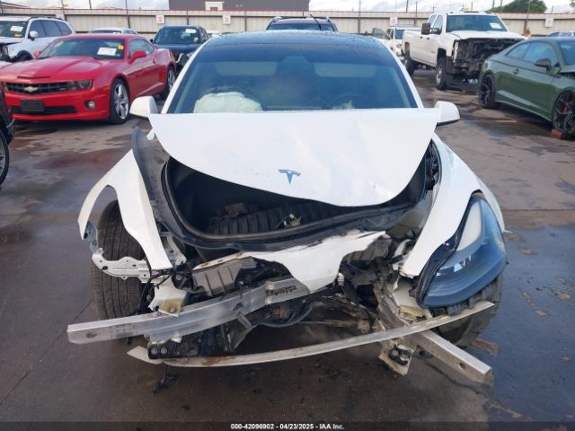 5YJ3E1EA3MF874212 Tesla 2021